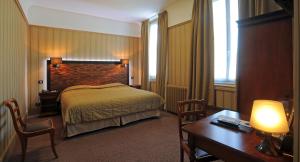 Hotels Le Grand Hotel : photos des chambres