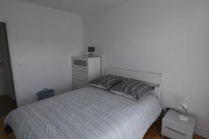 Appartements Au Pied de la Basilique : photos des chambres
