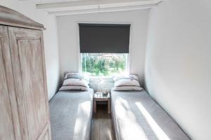 Bungalow Happy, vakantiewoning op loopafstand van strand & duinen!