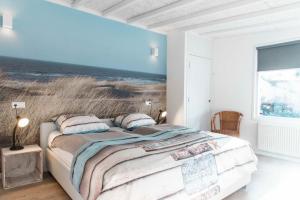 Bungalow Happy, vakantiewoning op loopafstand van strand & duinen!