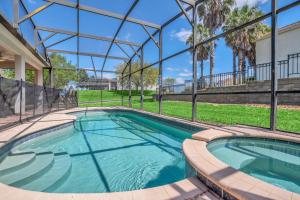 Family Room room in Large Pool Area and Game Room! 4BD Home Close to Disney! #4WH633