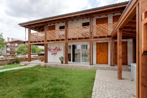 Къщи за гости Сноуфлейк Snowflake Chalet and Snowflake Lodge - 4hvězdičkové hotely ve městě Bansko