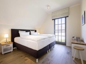 Reetland am Meer - Luxus Reetdachvilla mit 3 Schlafzimmern, Sauna und Kamin E07