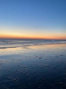 Bungalow Happy, vakantiewoning op loopafstand van strand & duinen!