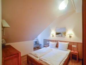 Dünenpark Binz - Komfortplus Ferienwohnung mit 1 Schlafzimmer und Balkon im Dachgeschoss 112