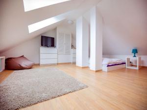 Dünenpark Binz - Komfortplus Ferienwohnung mit 1 Schlafzimmer und Balkon im Dachgeschoss 209