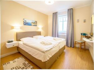 Dünenpark Binz - Komfortplus Ferienwohnung mit 1 Schlafzimmer und Balkon im Obergeschoss 253