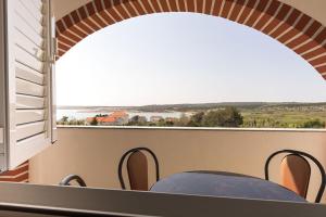 Apartment in Novalja with sea view, terrace, air conditioning, Wi-Fi (3565-2)