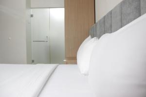 Deluxe & Cozy 3BR at Gateway Pasteur Apartment By Travelio