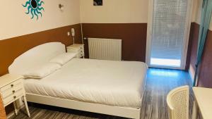 Hotels Hotel Martinez Grenay : photos des chambres