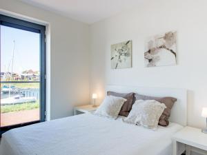 Apartment in Kamperland with Marina Views