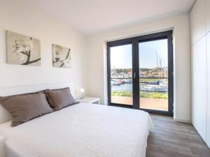 Apartment in Kamperland with Marina Views