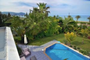 Seafront 3 bedroom villa Medea with private pool and garden.
