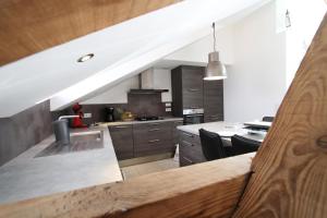 Appartements Le Grenier Geromois : photos des chambres