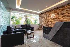 Aptly Premium Serviced Apartments - A BRAND UNIT OF SKYLA