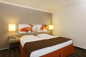 Family Room (2 Adults + 2 Children) room in H4 Hotel Frankfurt Messe