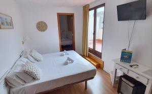 Family Room with Terrace room in Hotel Mireia