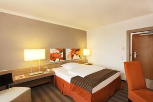 Comfort Single Room room in H4 Hotel Frankfurt Messe