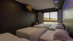 Hotels Hotel La Rocade : Chambre Quadruple