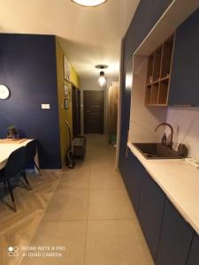 Nowoczesny Apartament przy Manufakturze z parkingiem podziemnym i klimatyzacją