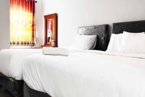 Pertiwi Homestay Near Museum Angkut Batu Mitra RedDoorz