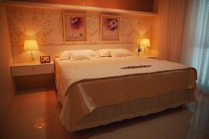 Apartamento alto padrão com 3 suítes, sala 3 ambientes todos com ar, ambientes novos e moderno.