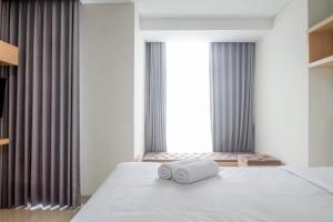 Spacious Studio Room Apartment at Grand Sungkono Lagoon By Travelio
