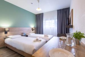 Appart'hotels Zenitude Hotel-Residences Le Mans Novaxis : photos des chambres