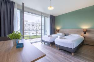 Appart'hotels Zenitude Hotel-Residences Le Mans Novaxis : photos des chambres