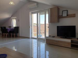 Two-Bedroom Apartment with Balcony and Sea View room in Apartments with a parking space Silo Krk - 18705