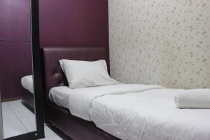 Strategic & Relaxing 2BR at Gateway Apartment Ahmad Yani Cicadas By Travelio