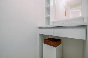 Simply Cozy 2BR Bassura City Apartment By Travelio