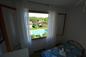 Lignano Riviera economico con piscina