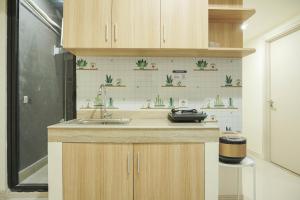 Comfy and Modern 2BR at Meikarta Apartment By Travelio