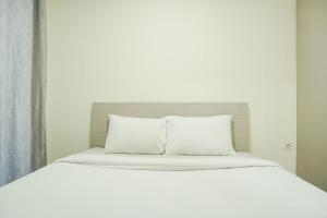 Comfy and Modern 2BR at Meikarta Apartment By Travelio
