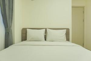 Brand New and Modern 2BR Meikarta Apartment By Travelio