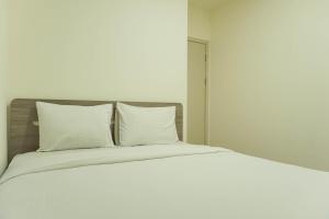 Brand New and Modern 2BR Meikarta Apartment By Travelio