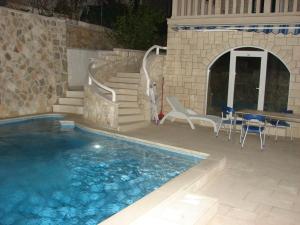 Apartment Aria with private heated pool 