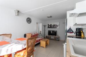Appartements Rez-de-chaussee centre ville d'Embrun 3 etoiles : photos des chambres