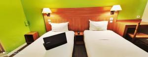 Hotels Glisy Hotel : photos des chambres