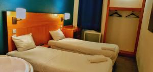 Hotels Glisy Hotel : photos des chambres