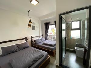 Phòng 4 Người Có Ban Công (Quadruple Room with Balcony)