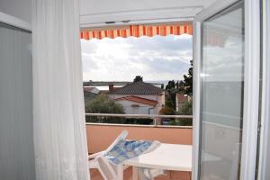 Two-Bedroom Apartment with Terrace and Sea View room in Apartment Novalja 6491b