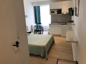 Appartements BELLE VUE MER STUDIO PISCINE : photos des chambres
