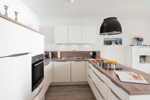 Appartement "Mondstein" mit Penthouseflair - Oase am Haff