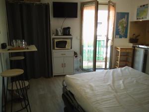 Appartements Studio du Commandant Marche : photos des chambres