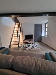Appartements Les Logis du rempart : photos des chambres