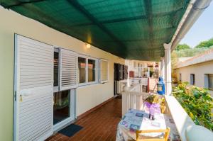 One-Bedroom Apartment with Patio and Sea View room in Apartments & Room BlueMoon
