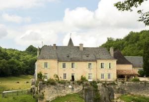 Maisons de vacances Maison d'une chambre avec vue sur le lac piscine partagee et jardin amenage a La Bachellerie : photos des chambres