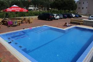 Studio apartment in Novalja with sea view, terrace, air conditioning, Wi-Fi (3565-4)